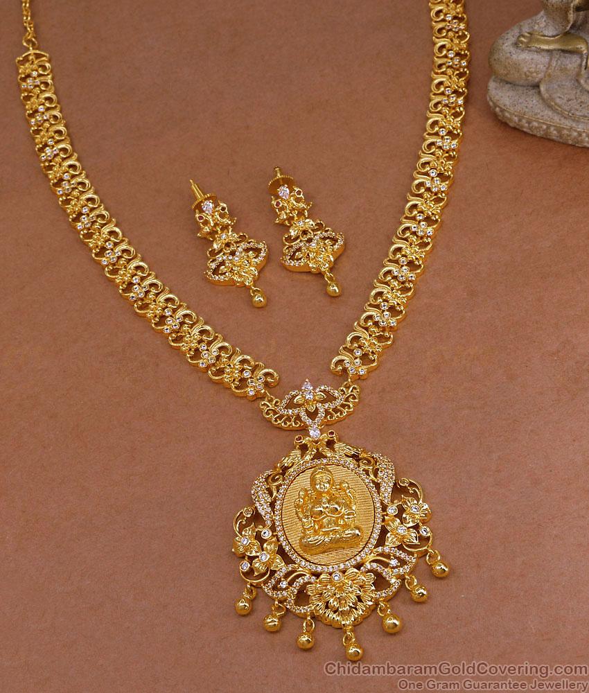 Big Lakshmi Pendant Gold Imitation Peacock Haram With Matching Earrings HR3628 Big Lakshmi Pendant Gold Imitation Peacock Haram With Matching Earrings HR3628