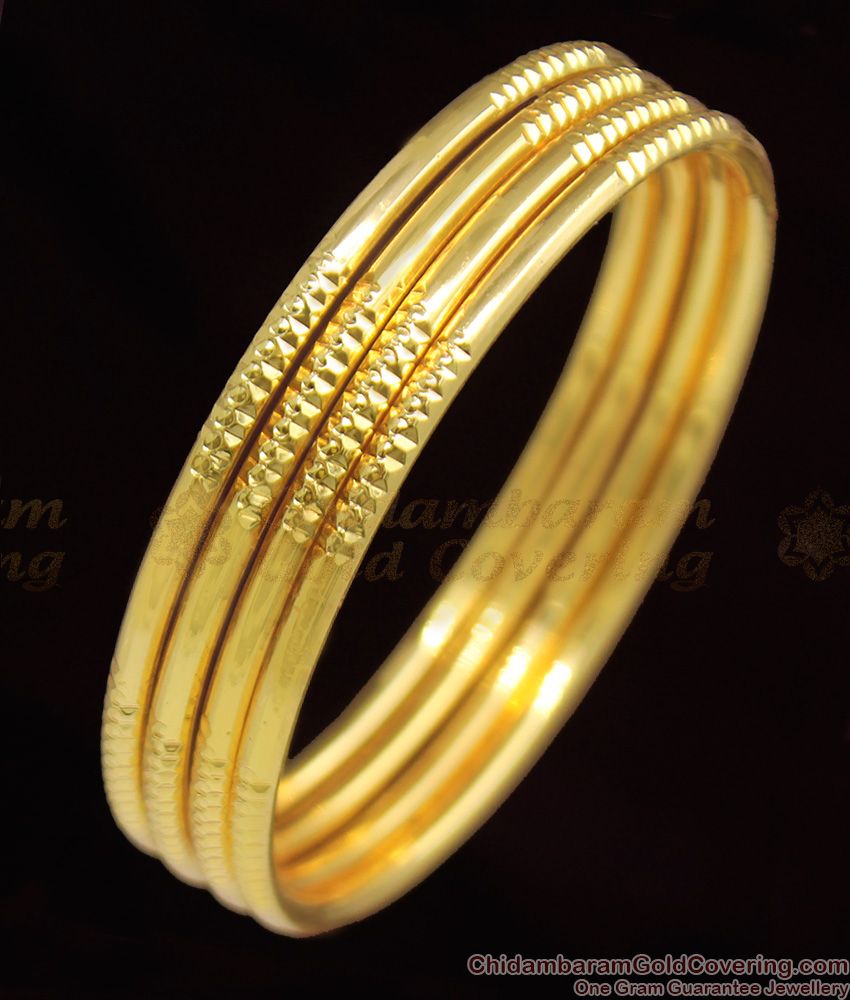 BR1082-2.6 Heavy Weight Simple Traditional Set Of Four Gold Finish Bangles Collection BR1082-2.6 Heavy Weight Simple Traditional Set Of Four Gold Finish Bangles Collection