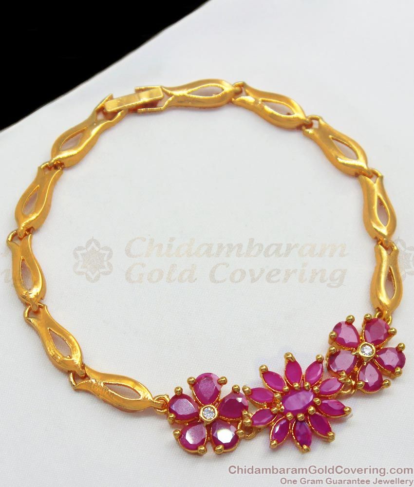 Solid Gold Bracelet with a Flower and Leaf Charm - Tales In Gold