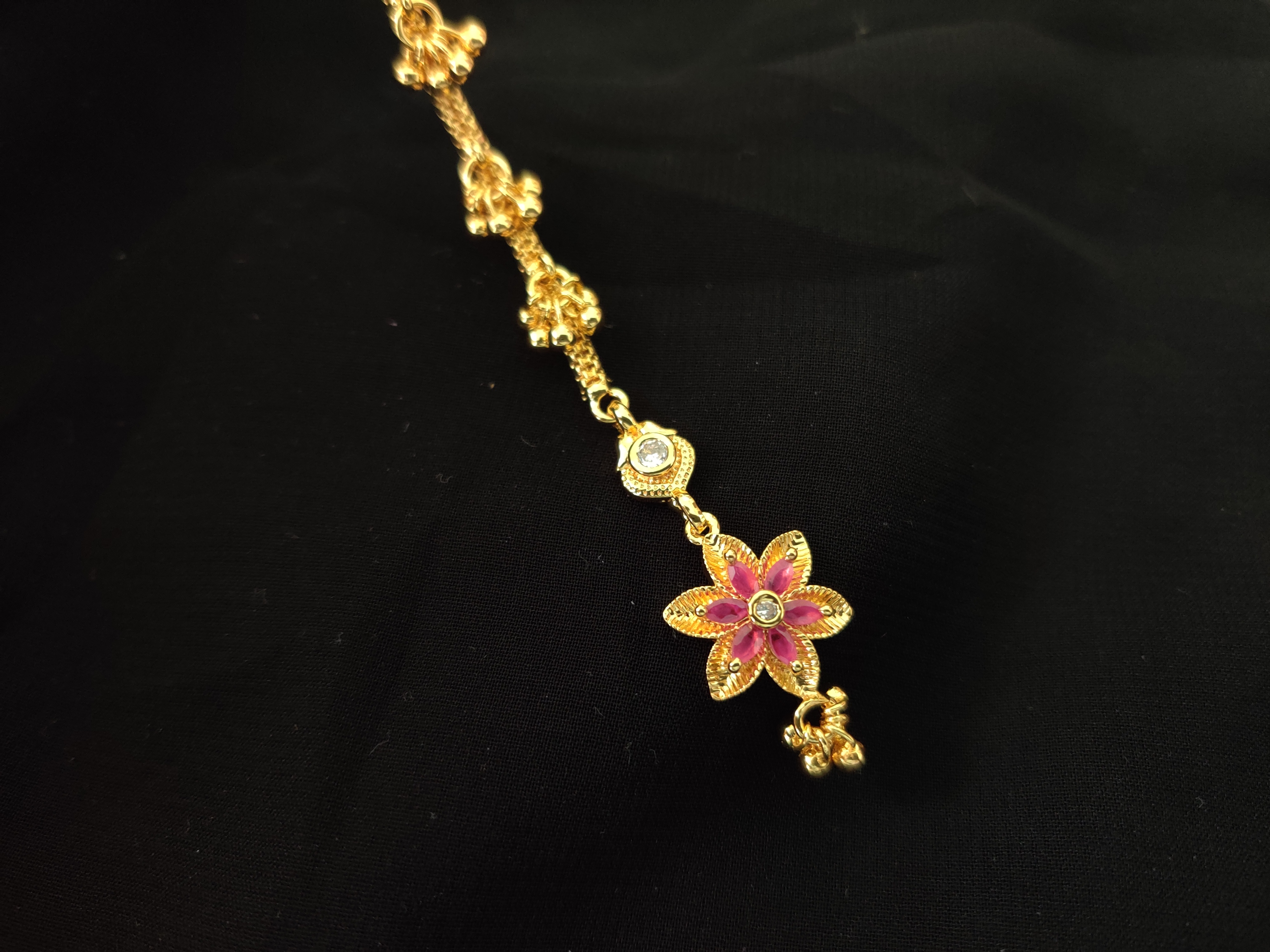 ladies gold tikka